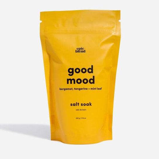 Yellow package of 'good mood' salt soak by epic blend on a white background