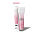 Two tubes of 'Hand Therapy' with a gradient design on a white background