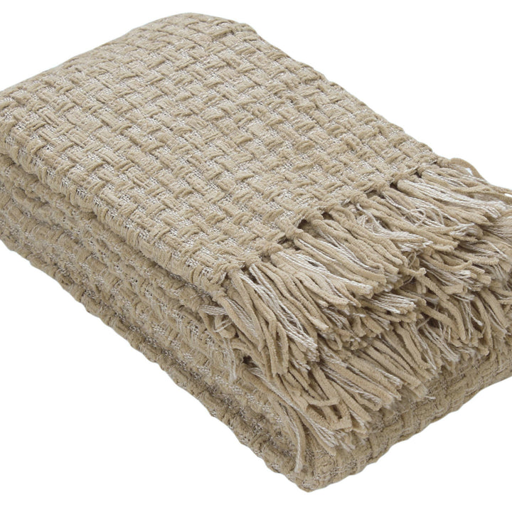 Beige woven throw blanket with fringes on a white background