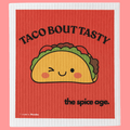 Swedish dish cloth with "Taco Bout Tasty" print, houseware by The Spice Age, showing a colorful kitchen towel on a countertop.