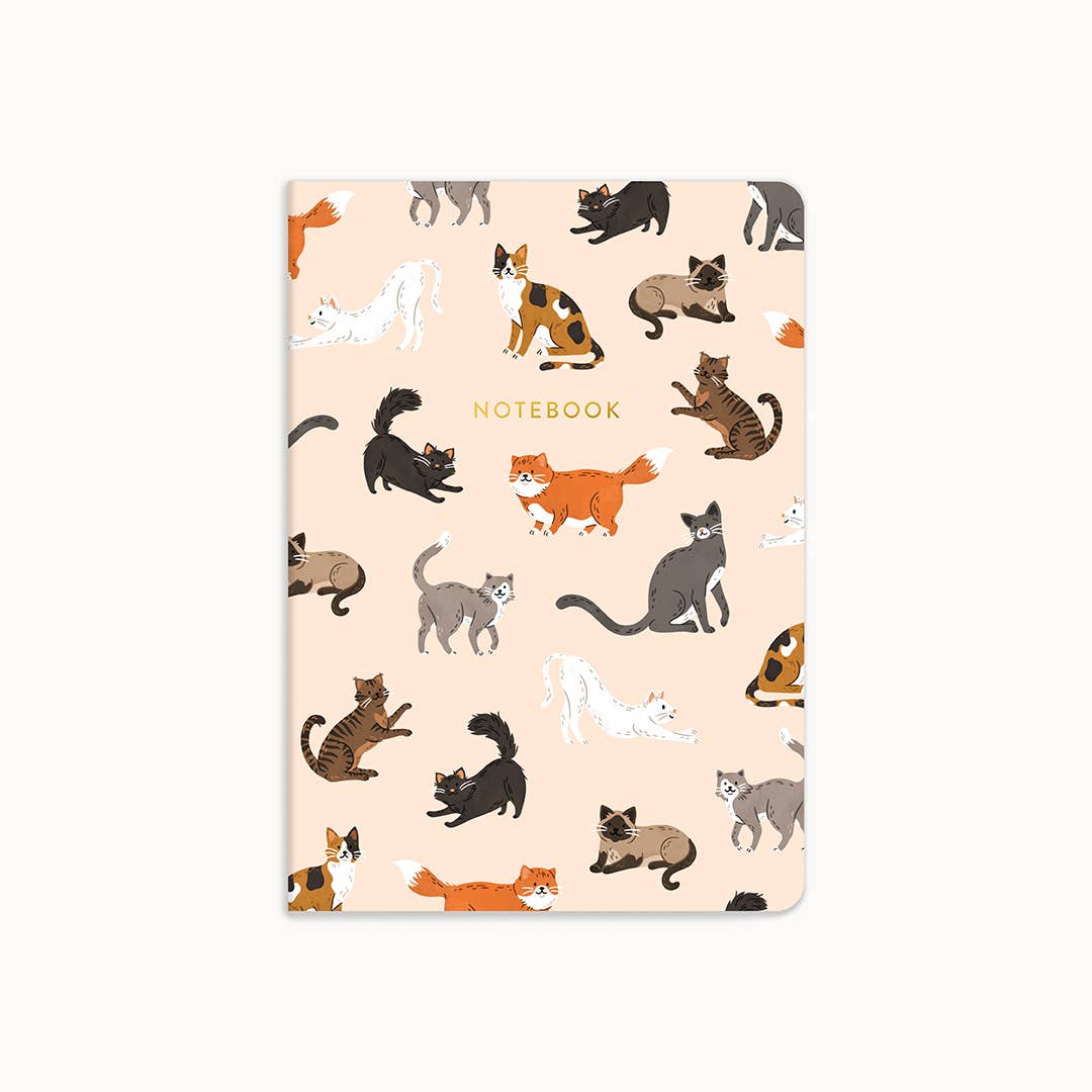 Notebook with cat pattern on a beige background
