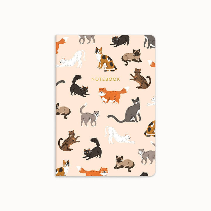 Notebook with cat pattern on a beige background