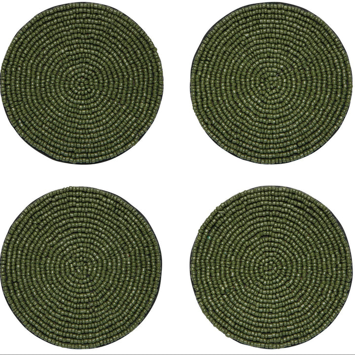 Four round woven placemats in a dark olive green color, arranged in a 2x2 grid on a solid white background.
