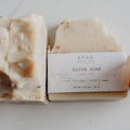 SOAK Bath Co Blush Soap Bar with pink and cream swirls, handcrafted soap showing a smooth, artisanal texture.
