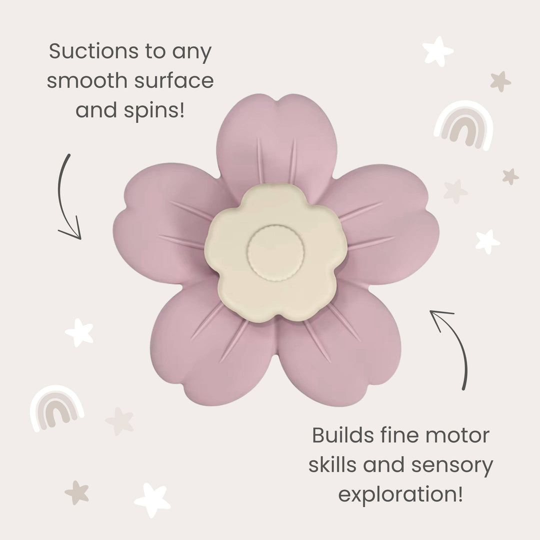 Pink flower-shaped object with text about its features on a light gray background