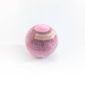 SOAK Bath Co Love Spell bath bomb with pink and purple swirls, designed for a relaxing and fragrant bath experience.
